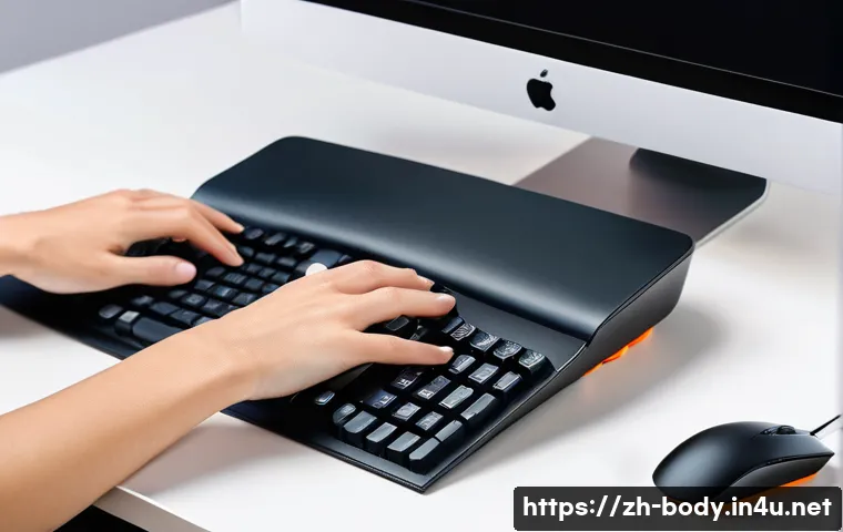 손목 통증을 줄이는 생활 습관 - A modern ergonomic office setup showing a person’s hands on a keyboard and mouse, positioned at arm ...