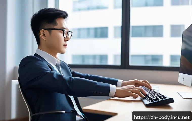 손목 보호 운동법 - A modern office environment scene showing a young Asian professional sitting at a desk with ergonomi...